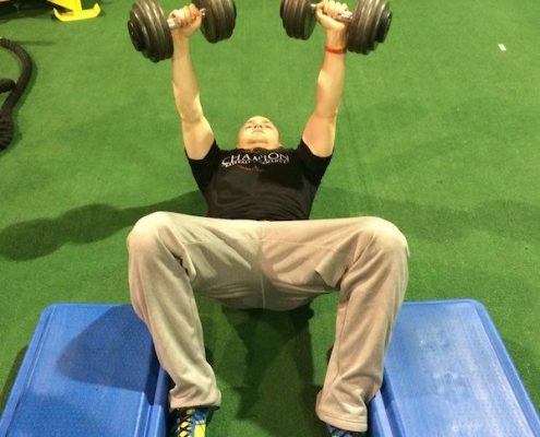 The Dead Stop Dumbbell Floor Press