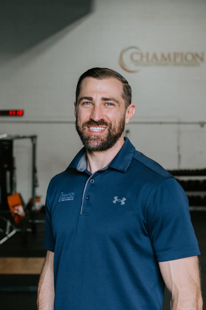 headshot of Dan Pope smiling